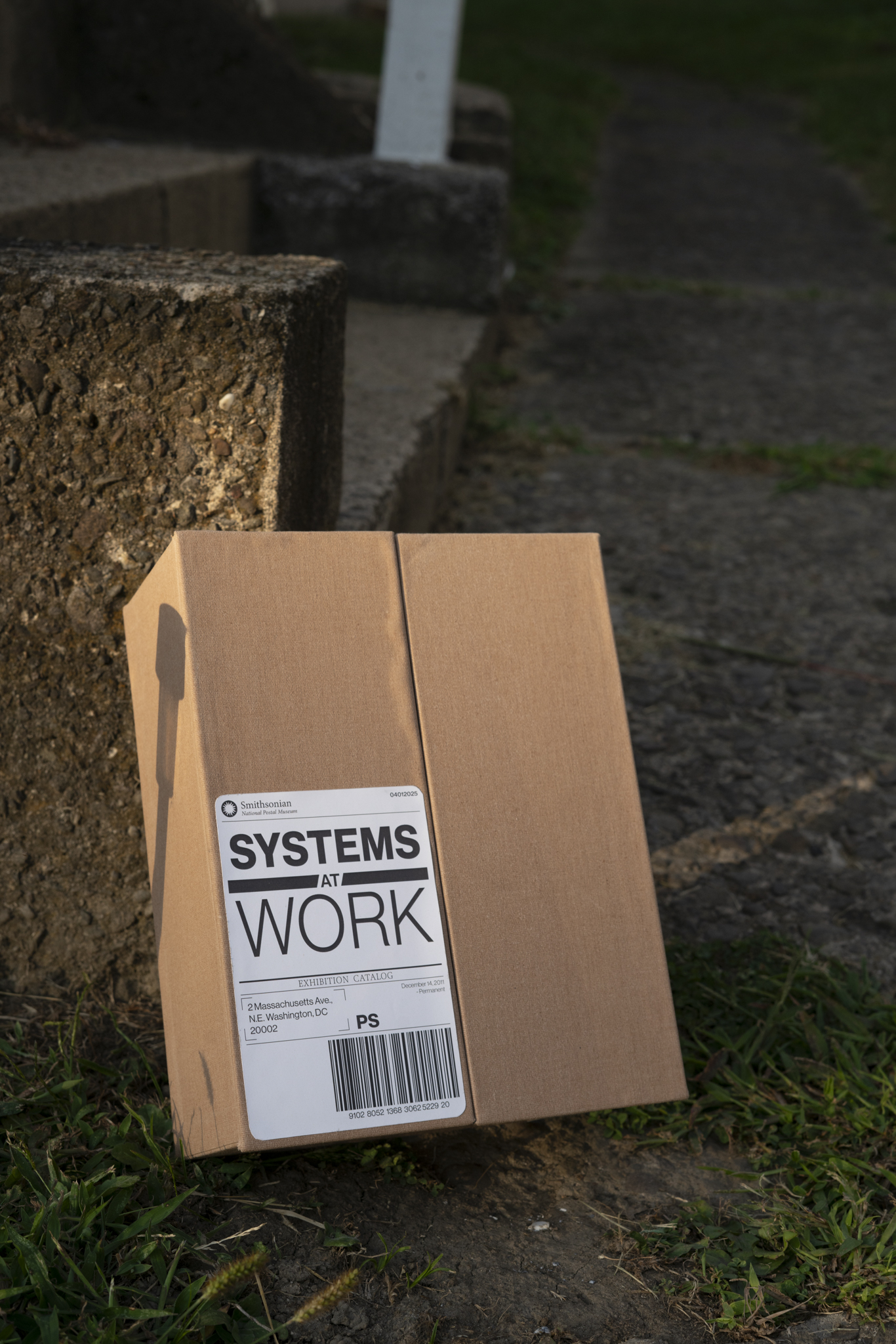 picture of a shipping box with the label systems at work.