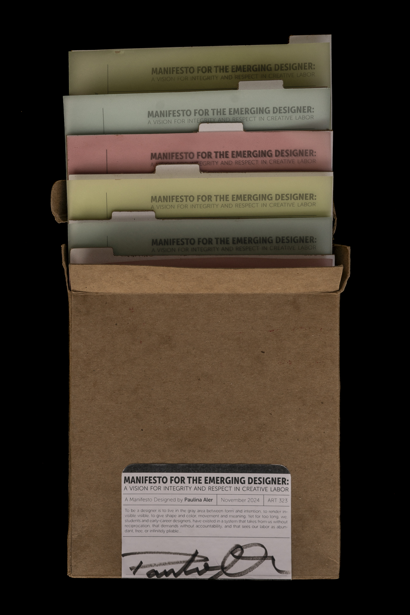 manifesto pages coming out of archival box